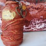 Small red bottle of hearts