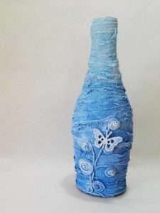 Pastel Powertex bottle in pale blue by Kore Sage