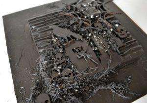 Use Black Powertex to paint, glue and harden materials